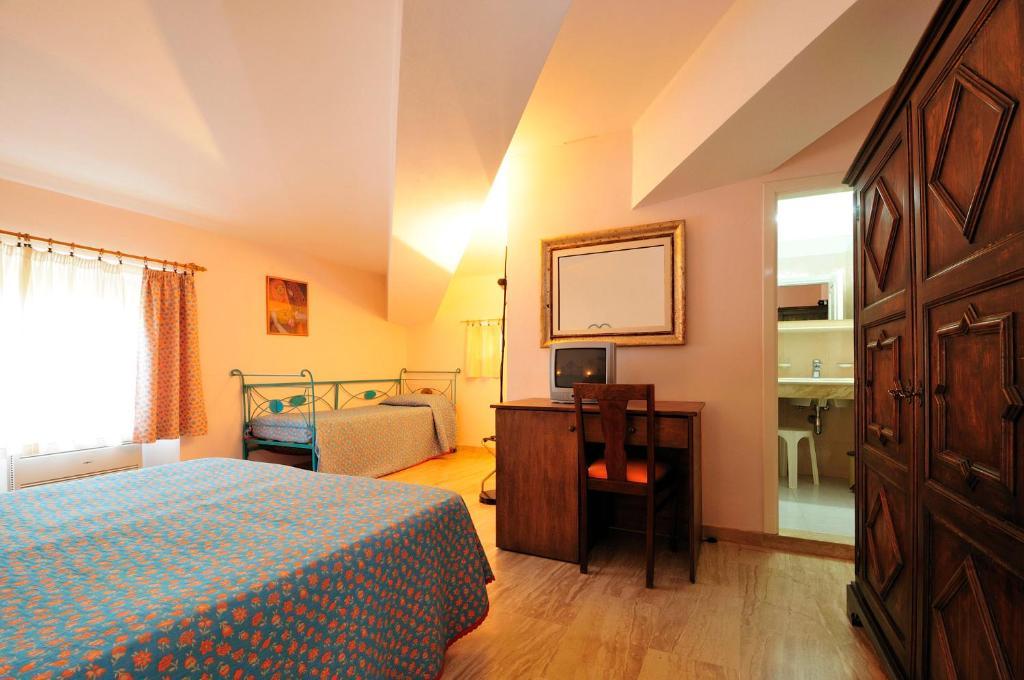Hotel Villa Campana Cala Liberotto Kamer foto